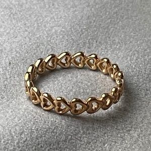 Pandora rose gold band of hearts ring